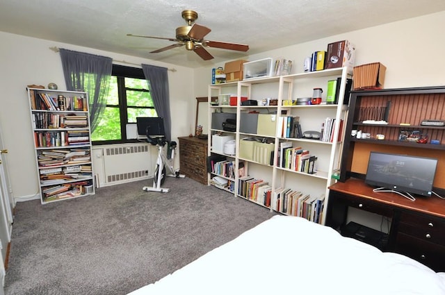 67 Rockledge Rd Unit 2A, Hartsdale, NY 10530 - home office with radiator heating unit, carpet flooring, ceiling fan, and baseboards