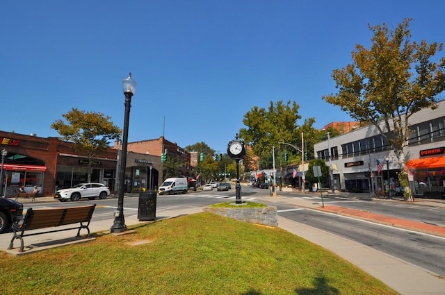 67 Rockledge Rd Unit 2A, Hartsdale, NY 10530 - view of asphalt road featuring street lights, sidewalks, and curbs