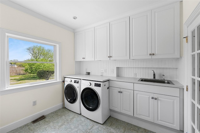 14 S Country Rd, Westhampton, NY 11977 - laundry area with cabinet space, washer and dryer, wet bar, and light tile patterned flooring