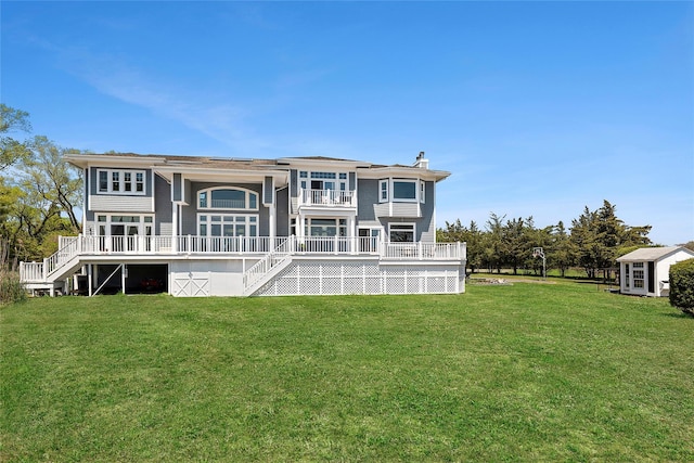 14 S Country Rd, Westhampton, NY 11977 - back of property with stairway, a yard, a balcony, and a chimney