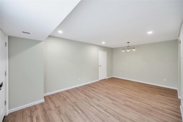 9 Sierra Ct Unit 0, Coram, NY 11727 - spare room featuring a chandelier, light wood-style floors, baseboards, and recessed lighting
