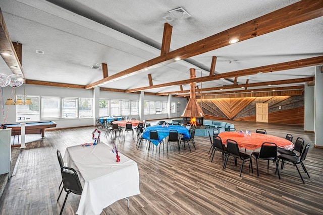 9 Sierra Ct Unit 0, Coram, NY 11727 - dining room with billiards, wooden walls, wood finished floors, and a textured ceiling