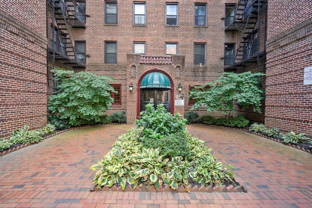 89-10 35th Ave Unit F2L, Jackson Heights, NY 11372 - view of exterior entry with brick siding