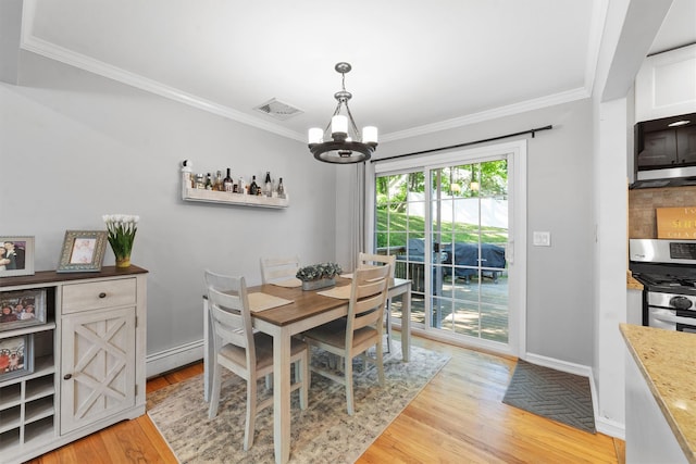 10 Ridge Rd, Cortlandt Manor, NY 10567 - dining room featuring a chandelier, ornamental molding, light wood finished floors, a baseboard heating unit, and baseboards