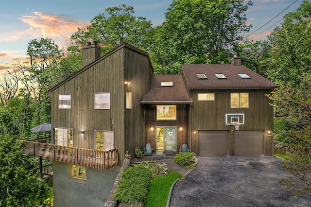 1260 Albany Post Rd, Croton-On-Hudson, NY 10520 - chalet / cabin with a chimney, driveway, a shingled roof, and an attached garage