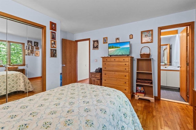 1260 Albany Post Rd, Croton-On-Hudson, NY 10520 - bedroom featuring hardwood / wood-style floors, a closet, and ensuite bath