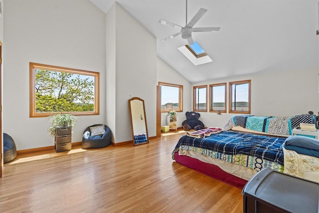 1260 Albany Post Rd, Croton-On-Hudson, NY 10520 - bedroom featuring high vaulted ceiling, a skylight, light wood-type flooring, and a ceiling fan