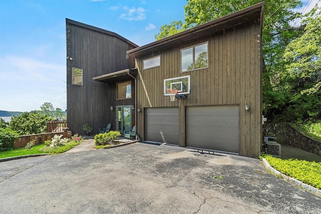 1260 Albany Post Rd, Croton-On-Hudson, NY 10520 - view of front of house featuring asphalt driveway
