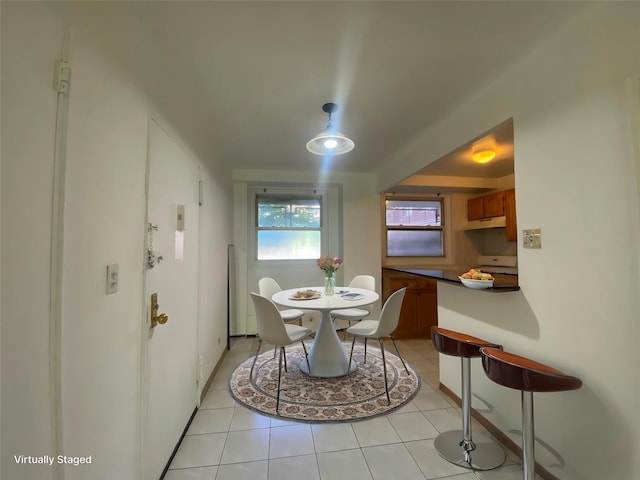 98-05 63rd Rd Unit 1C, Rego Park, NY 11374 - dining room with light tile patterned floors