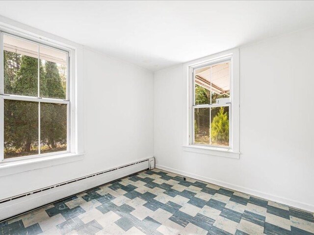 58 Hathorn Blvd, Port Jervis, NY 12771 - spare room with a baseboard radiator