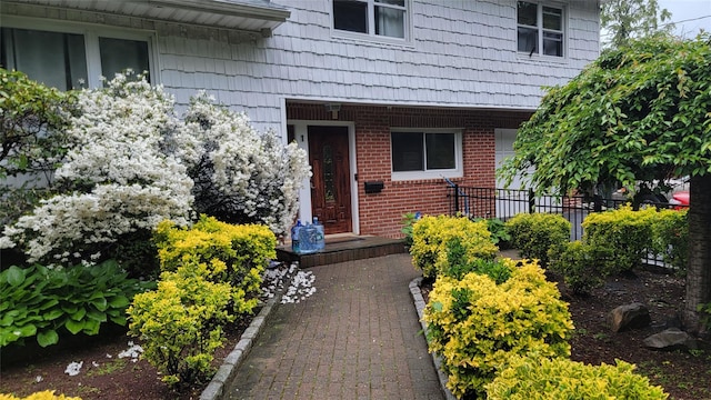 1 Cheshire Ln, Yonkers, NY 10710 - property entrance featuring brick siding