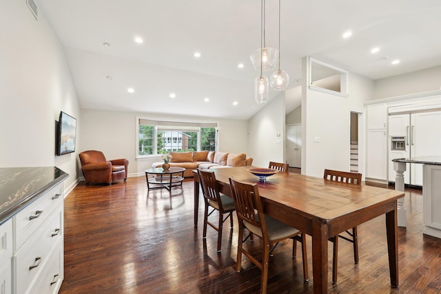 56 Rolling Way, New Rochelle, NY 10804 - dining space featuring vaulted ceiling, dark wood-style flooring, and recessed lighting