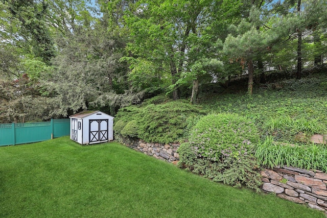56 Rolling Way, New Rochelle, NY 10804 - view of yard featuring a storage unit and an outbuilding