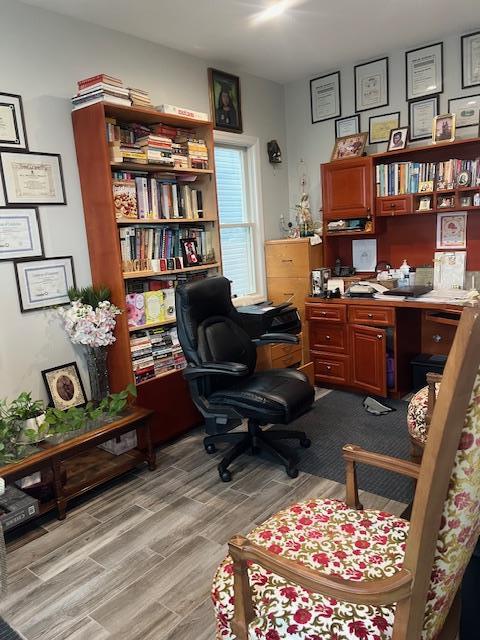 office area with light wood-style floors