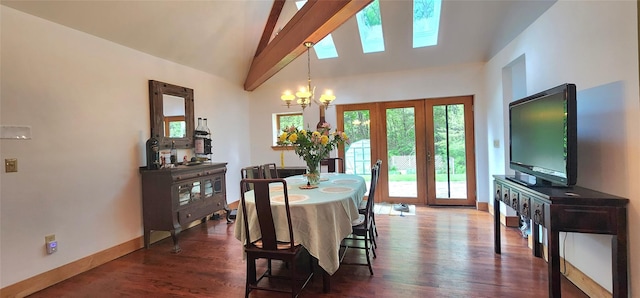 dining room with french doors, dark wood-style flooring, a chandelier, baseboards, and high vaulted ceiling