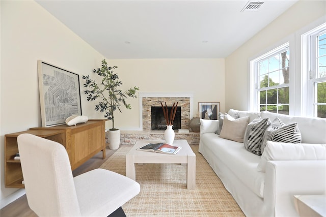 living area featuring a fireplace