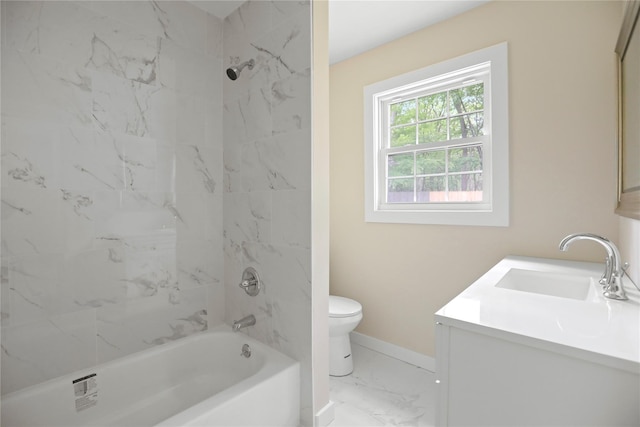 full bath featuring marble finish floors, toilet, baseboards, vanity, and  shower combination