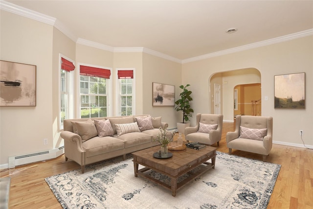 67 N Airmont Rd, Suffern, NY 10901 - living area featuring a baseboard radiator, arched walkways, wood finished floors, crown molding, and baseboards