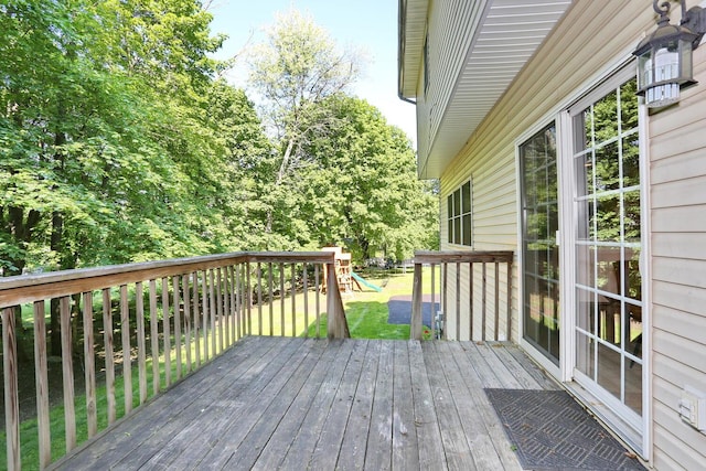 67 N Airmont Rd, Suffern, NY 10901 - wooden terrace with a playground and a yard