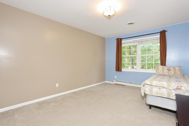 67 N Airmont Rd, Suffern, NY 10901 - carpeted bedroom featuring a baseboard radiator and baseboards