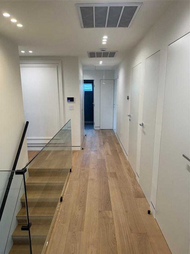 357 Argyle, Cedarhurst, NY 11516 - hall with recessed lighting, light wood-type flooring, and attic access