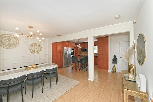 45 Longworth Ave, Dix Hills, NY 11746 - dining space with ornamental molding, a chandelier, light wood-style floors, and baseboards