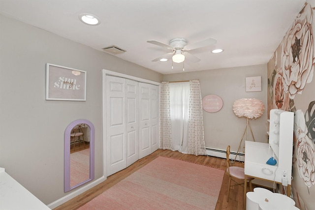 45 Longworth Ave, Dix Hills, NY 11746 - office area featuring ceiling fan, baseboard heating, wood finished floors, recessed lighting, and baseboards