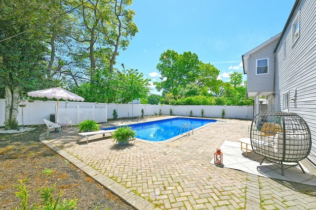 45 Longworth Ave, Dix Hills, NY 11746 - view of swimming pool featuring a fenced backyard and a patio area