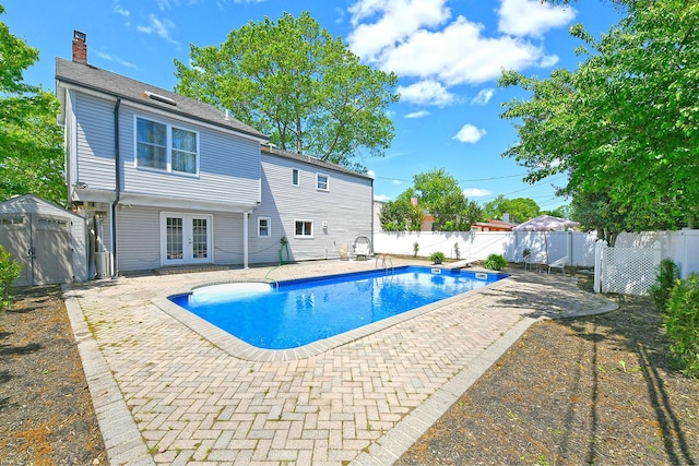 45 Longworth Ave, Dix Hills, NY 11746 - view of pool with french doors, a patio area, and a fenced backyard
