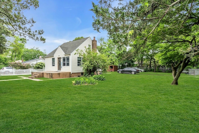 17 Lexington Rd, Shirley, NY 11967 - view of property exterior with a chimney and a shingled roof