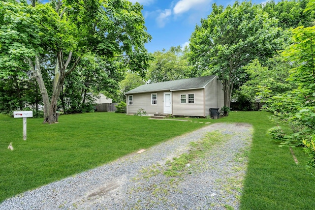 625 Scherger Ave, East Patchogue, NY 11772 - view of front of property featuring driveway and view of wooded area