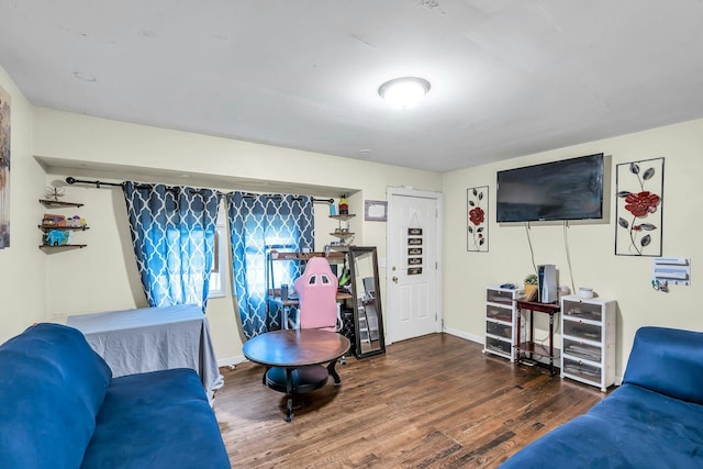 625 Scherger Ave, East Patchogue, NY 11772 - living room featuring wood finished floors and baseboards