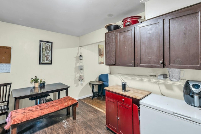 625 Scherger Ave, East Patchogue, NY 11772 - kitchen featuring dark wood finished floors, baseboards, and light countertops