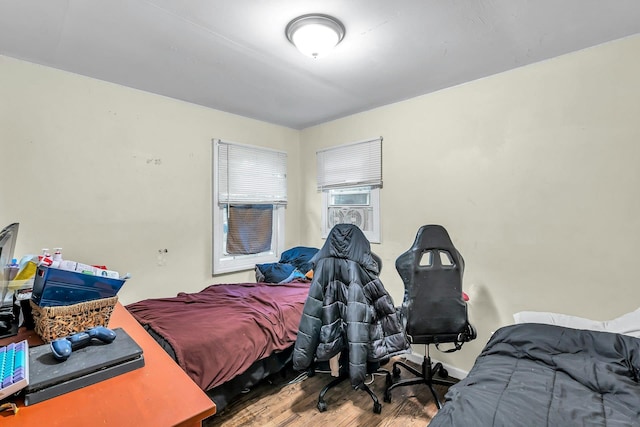 625 Scherger Ave, East Patchogue, NY 11772 - bedroom featuring wood finished floors