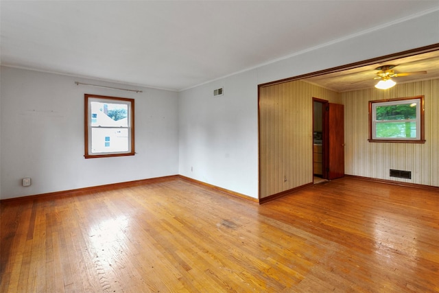 21 Patricia Ave, Fishkill, NY 12524 - empty room with light wood-style floors, baseboards, a ceiling fan, and crown molding