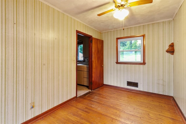 21 Patricia Ave, Fishkill, NY 12524 - unfurnished room with wood finished floors, a ceiling fan, baseboards, and crown molding
