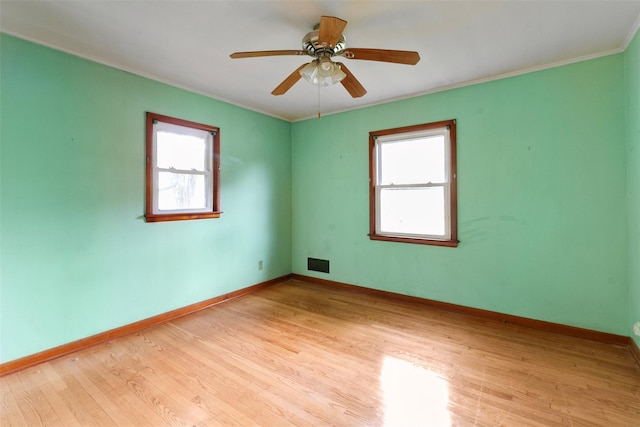 21 Patricia Ave, Fishkill, NY 12524 - empty room featuring light wood finished floors, crown molding, and baseboards