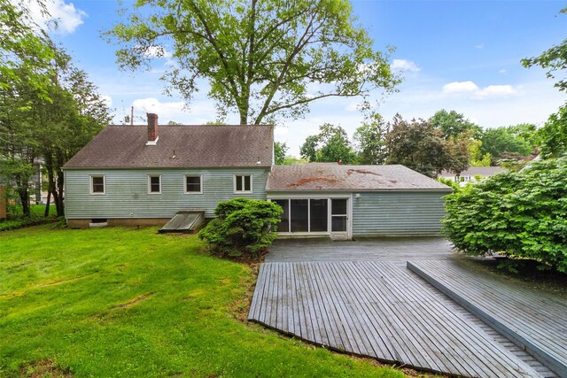 21 Patricia Ave, Fishkill, NY 12524 - rear view of property with a deck, a chimney, and a yard