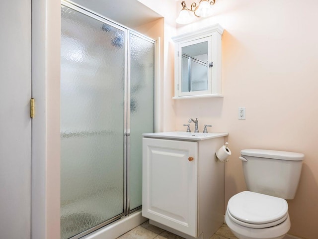 902 Commons Way Unit B, Fishkill, NY 12524 - bathroom with a stall shower, toilet, vanity, and tile patterned flooring