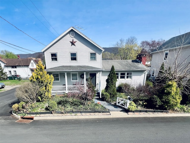49 N Chestnut St, Beacon, NY 12508 - traditional-style house featuring a porch