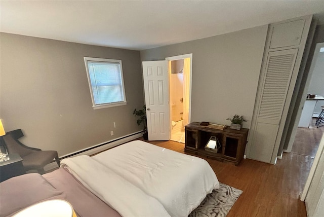 49 N Chestnut St, Beacon, NY 12508 - bedroom featuring wood finished floors, baseboard heating, and ensuite bathroom