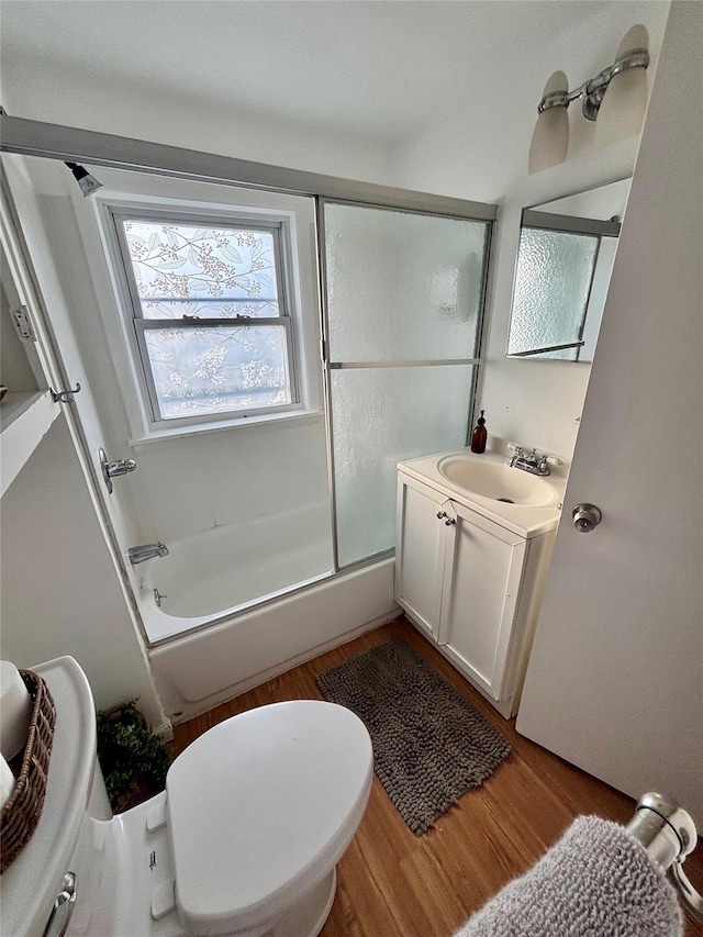 49 N Chestnut St, Beacon, NY 12508 - full bath featuring vanity, wood finished floors, and enclosed tub / shower combo