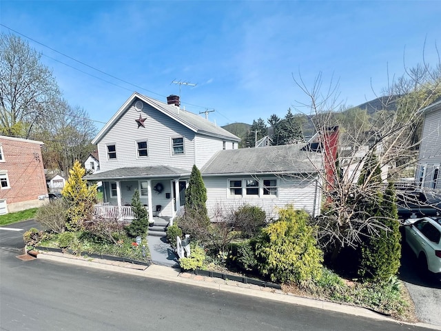 49 N Chestnut St, Beacon, NY 12508 - traditional-style home featuring a porch
