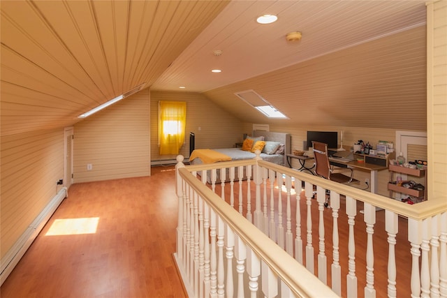 964 Pemart Ave, Peekskill, NY 10566 - bonus room with baseboard heating, lofted ceiling, light wood-type flooring, wooden walls, and wooden ceiling