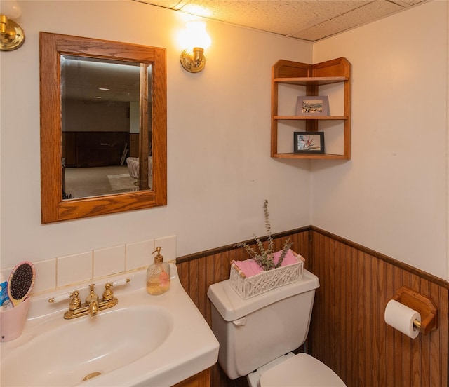 964 Pemart Ave, Peekskill, NY 10566 - half bath featuring wainscoting, toilet, and vanity