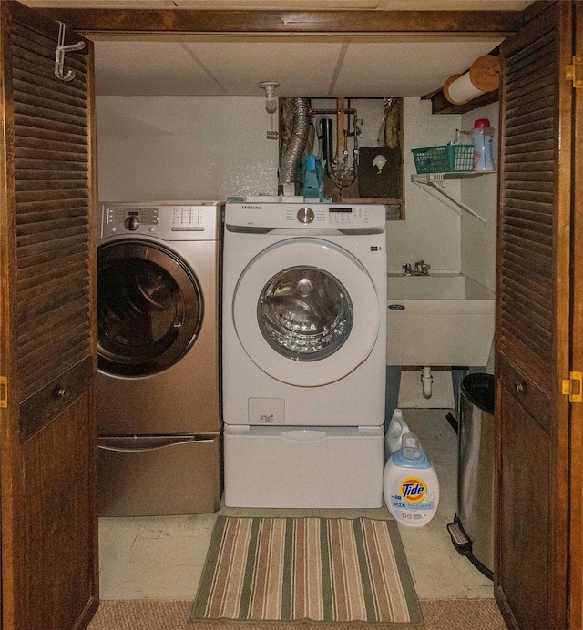 964 Pemart Ave, Peekskill, NY 10566 - washroom with washing machine and clothes dryer