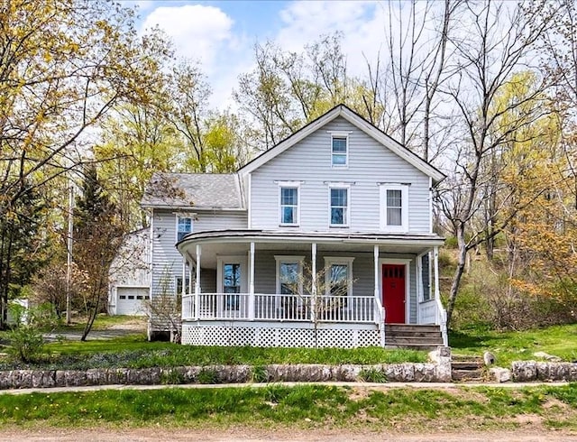 239-241 Hurleyville Main St, Hurleyville, NY 12747 - view of front of home featuring a porch and a garage