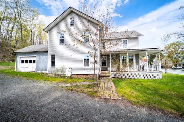 239-241 Hurleyville Main St, Hurleyville, NY 12747 - view of front of home with a porch, a front lawn, a garage, roof with shingles, and driveway