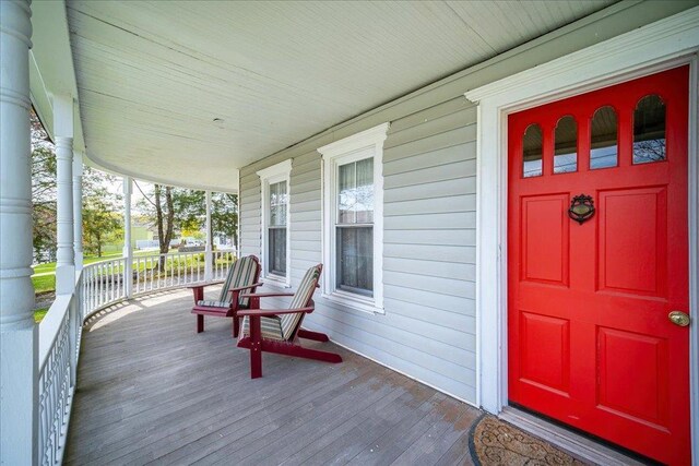 239-241 Hurleyville Main St, Hurleyville, NY 12747 - wooden terrace featuring a porch