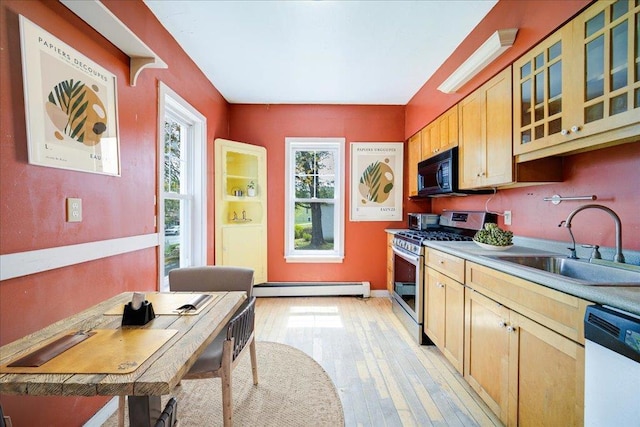 239-241 Hurleyville Main St, Hurleyville, NY 12747 - kitchen featuring gas stove, a baseboard radiator, a sink, black microwave, and dishwasher